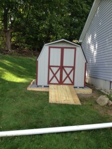 Slideshow Image - Light grey with red trim on optional site prep and longer ramp.